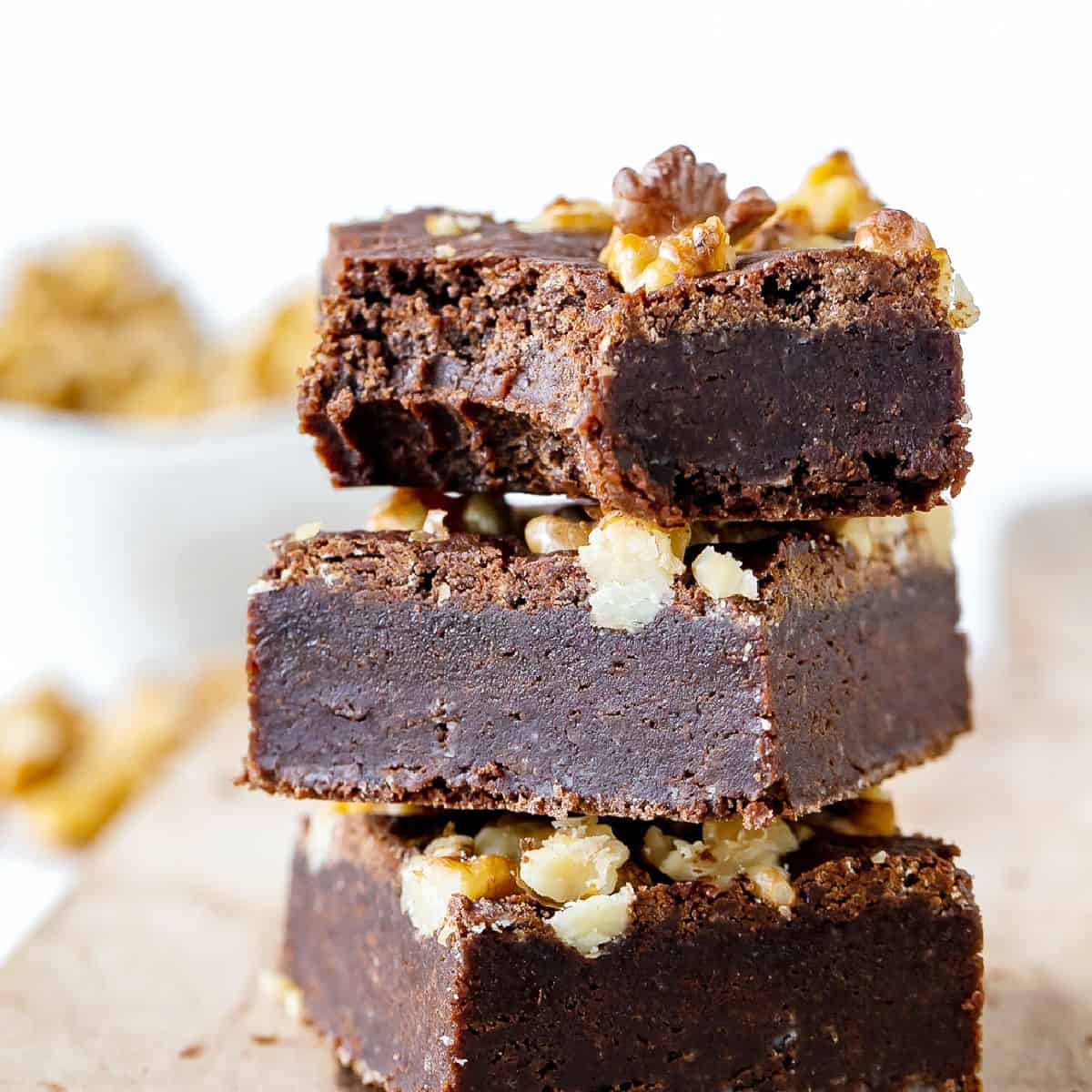 Stack of brownies with walnuts